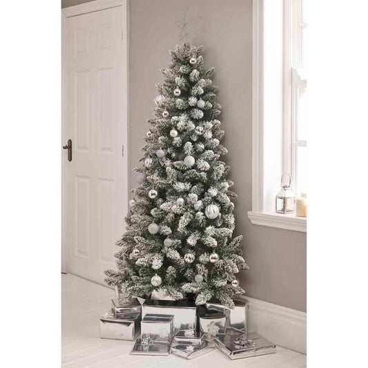 Key features: 6-ft artificial snow-flocked Christmas tree, unlit, foldable design, realistic foliage, ideal for home decoration, includes metal stand